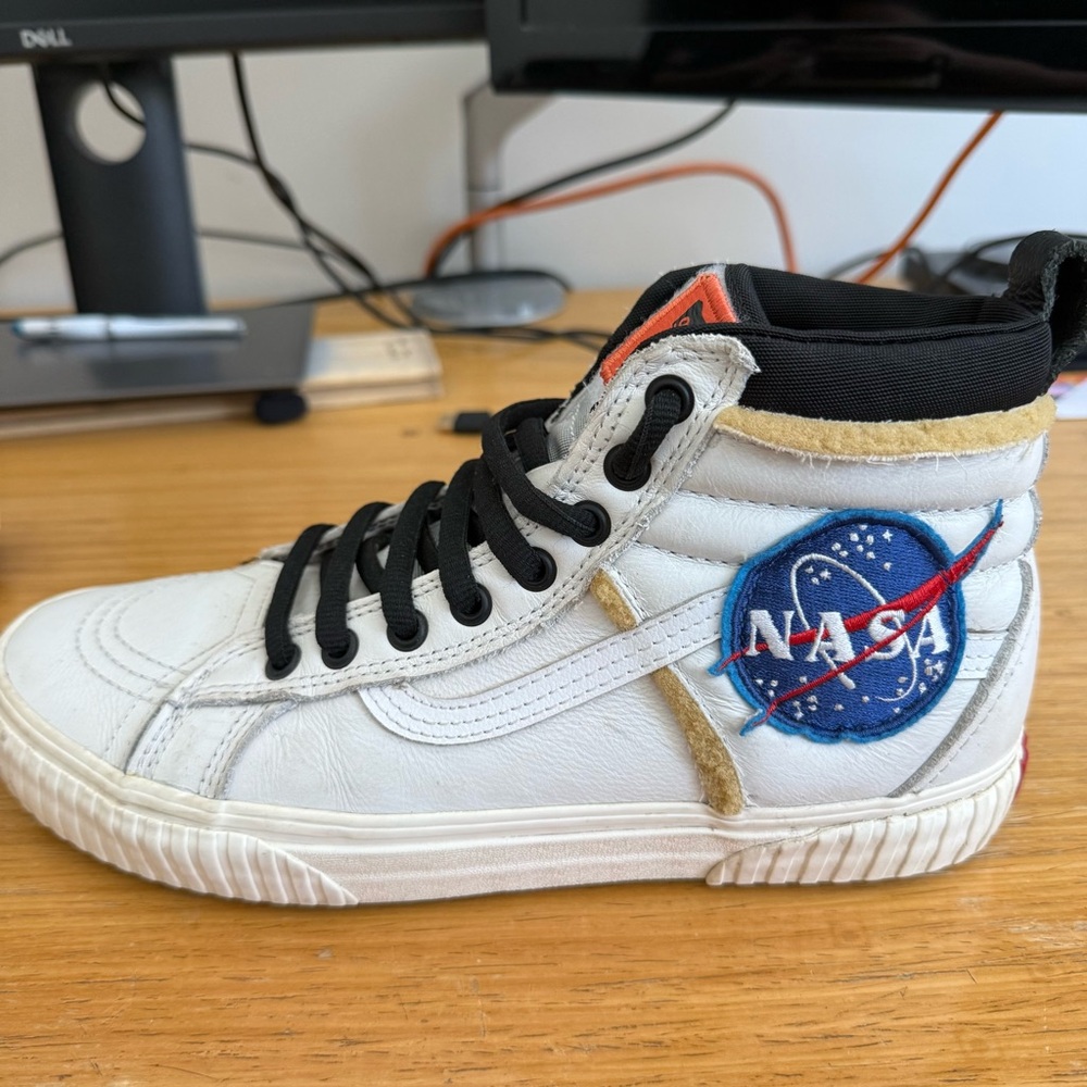 Vans White High-Top Sneaker with NASA Patch and Black Trim
